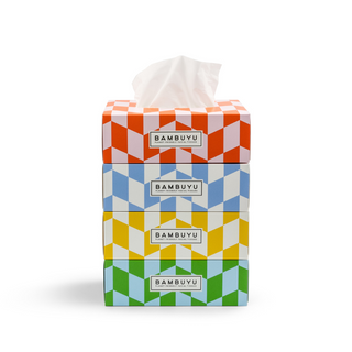 Stacked Tissue boxes with colorful modern design rectangular boxes against white background