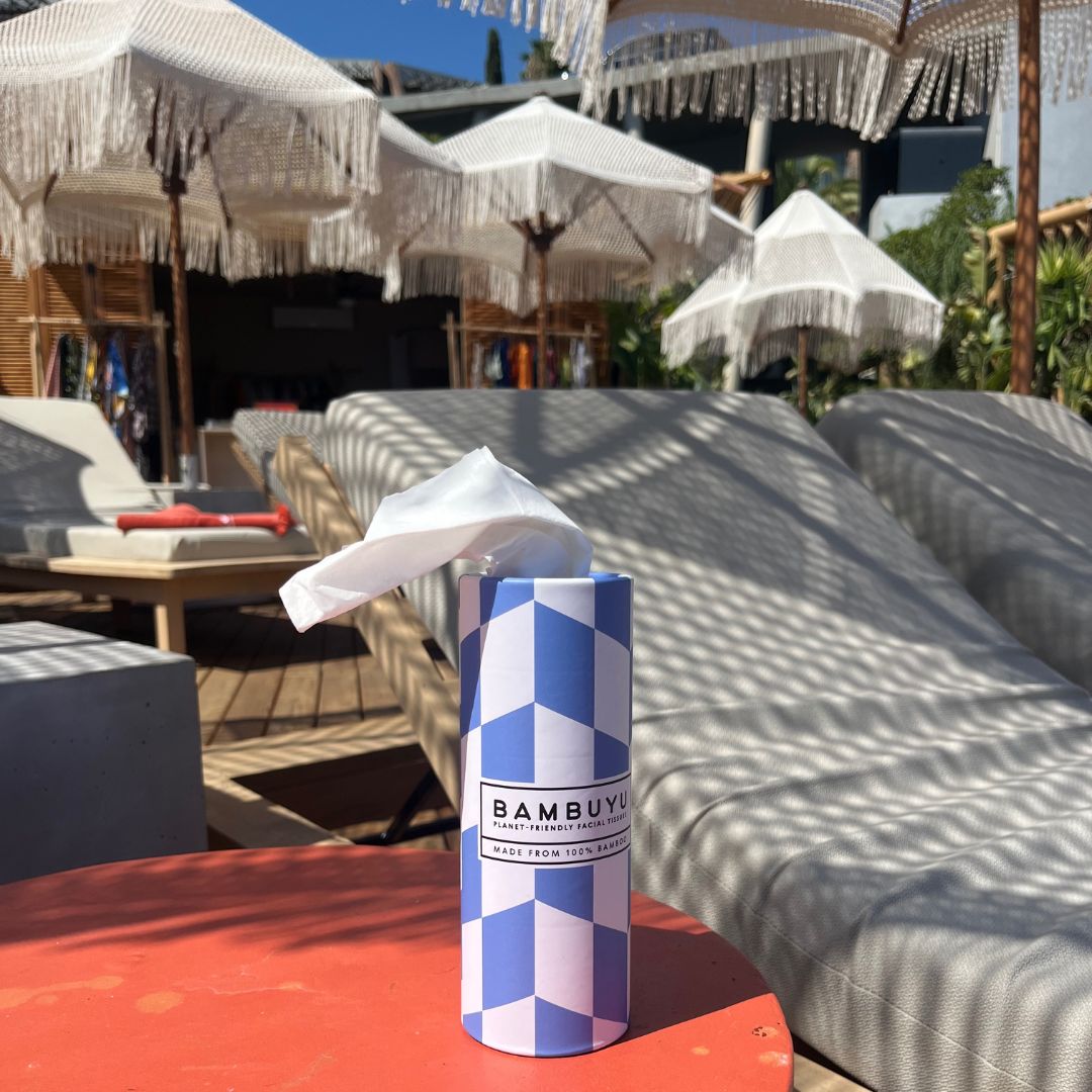 Bambuyu bamboo tissue tube on an outdoor lounge table