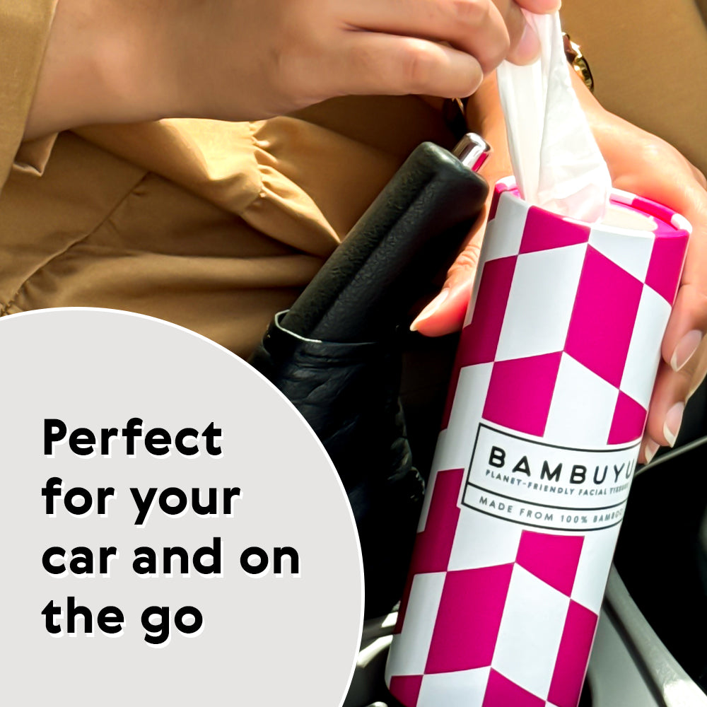 Bambuyu bamboo car tissue tube held in a car with text 'Perfect for your car and on the go'